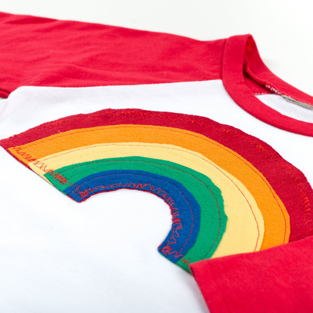 
                      
                        Kid's RAINBOW Raglan T-Shirt
                      
                    